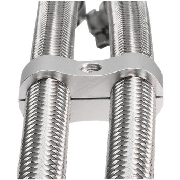 Close-up of two parallel, textured metal rods held together by a Jagg Oil Coolers Hose Separator - Silver - 3/8, featuring a central hole in its smooth billet aluminum bracket.