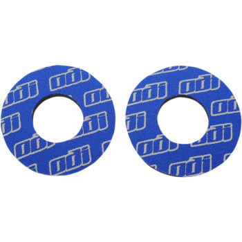 Pair of blue circular handlebar grip donuts with white repeating Odi logo pattern.
