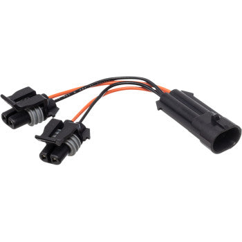 The Indian Y-Power Adapter Harness by Namz is black with one large connector on one end and two smaller connectors on the other, all connected by red and black wires for Indian motorcycles.