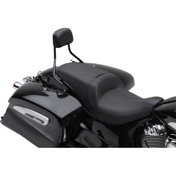 A black motorcycle seat with a Detachable Backrest - Black - Short by Cobra, mounted on a glossy black touring bike featuring saddlebags and chrome accents.