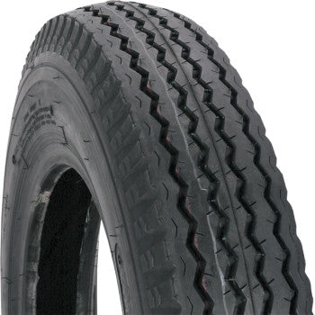 A close-up of the Kenda Tire 5.30-12 6 Ply, a black tubeless nylon trailer tire with a classic zigzag tread pattern, is shown upright at an angle against a white background.