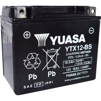 Black rectangular Yuasa YTX12BS battery with white branding and safety symbols on the front panel.