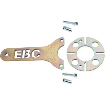 The Honda - Kawasaki Clutch Basket Holding Tool with Stepped Handle by EBC, a round metal plate with four holes, and four small clutch retainer bolts are displayed on a white background.