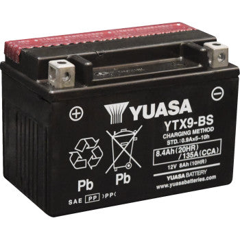 Black rectangular Yuasa YTX9-BS motorcycle battery with metal terminals and white printed specifications on the front.