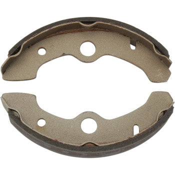 Pair of curved metallic brake shoes with dark friction lining and central mounting holes.