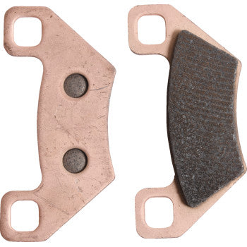 Two Sintered Brake Pads by All Balls are shown: one displays its textured friction surface, while the other reveals a flat metal backing with two round indentations and four mounting holes for reliable stopping power.