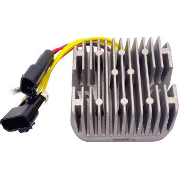 Rectangular silver metal regulator with vertical cooling fins and two black electrical connectors attached to yellow and red