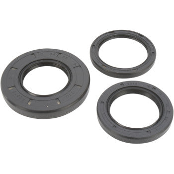 Three black rubber seals of varying sizes from the Kawasaki Differential Seal Kit Rear by Moose Offroad are arranged on a white background. These circular seals with ridged edges are ideal for high-speed EMQ bearings or differential service kits.
