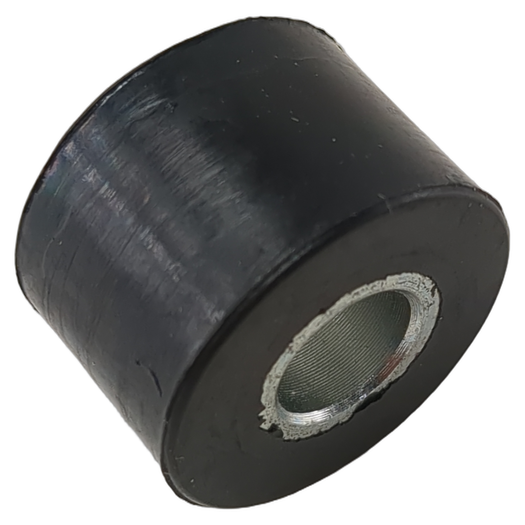 Black cylindrical shock absorber bushing with a metal-lined center opening.