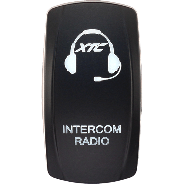 A black Dash Switch Rocker Face Intercom Radio by XTC Power, featuring a headset icon and XTC above the label, is displayed against a plain background.