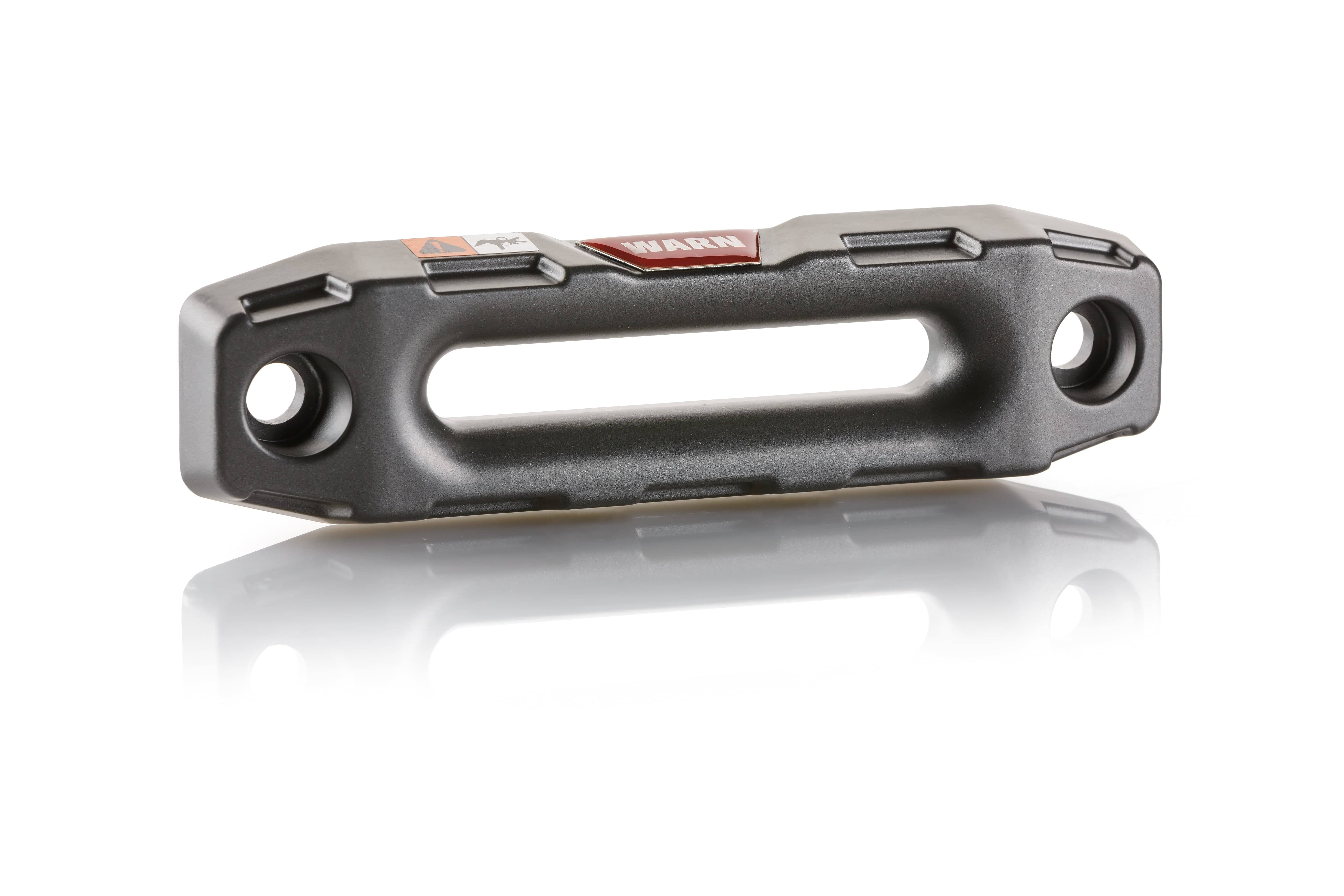 The WARN Epic Powersports Replacement Hawse Fairlead (Long) for Axon 45-S / 55-S and VRX 45-S winches is a black metal fairlead with rounded edges, two circular mounting holes, a rectangular center slot, and the WARN logo on top.