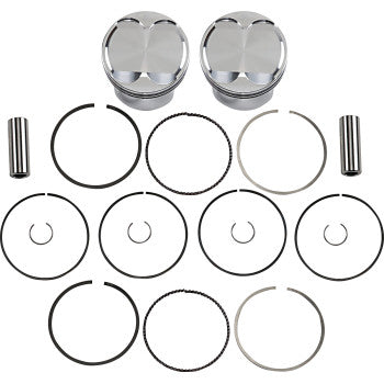 The Piston Kit by JE Pistons includes two forged aluminum pistons, two cylindrical pins, multiple piston rings, and clips arranged on a white background, showcasing a complete pro series engine set.