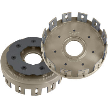 The Honda TRX R Billet Clutch Basket by Barnett, CNC-machined from billet aluminum with stainless steel drive inserts, features slotted edges and central holes. Shown from various angles on a white background.