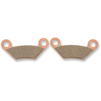 Pair of copper-colored sintered brake pads with a curved friction surface designed for off-road use.