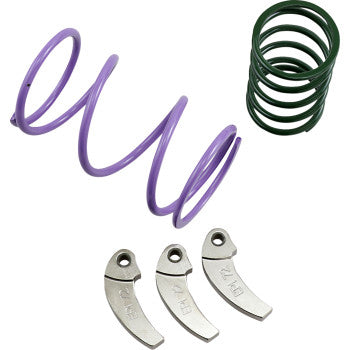 Two coiled metal springs, one purple and one green, along with three small curved metal parts, are displayed on a white background. These are key components of the Clutch Kit by Epi, designed for optimal low-range acceleration in trail riding.