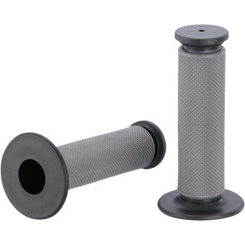 Two gray Qualifier Grips Diamond by Moose Offroad, one flat and one upright, feature dual diamond-texture compounds with flared ends for twist throttle bikes or motorcycles, offering a firm and soft compound combo for added comfort.