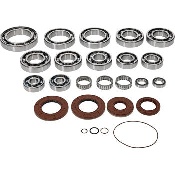 The Polaris Transaxle Bearing Seal Kit by Moose Offroad includes EMQ quality bearings, needle bearings, brown rubber seals, and O-rings arranged in rows on a white background.