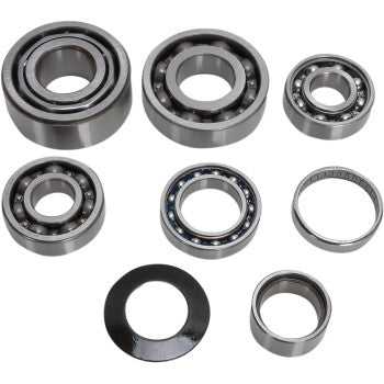 The Transmission Bearing Kit by Hot Rods, featuring open and closed bearings, washer rings, spacer rings, and shift drum bearing assemblies in various sizes, is arranged on a white background.