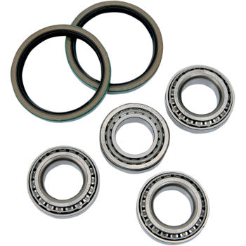 Six metal bearings and two black and green circular seals from the Strut Bearing Kit Front by Pivot Works are arranged on a white background, ideal for McPherson strut bearing replacements or use in a front strut repair kit.