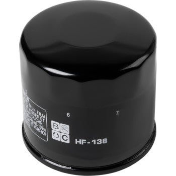 A black cylindrical 10 micron oil filter labeled HF-138 with white markings stands upright on a white background. The Suzuki - Arctic Cat Oil Filter by Moose Offroad is an ideal replacement filter for your vehicle.
