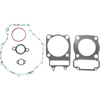 The Polaris Complete Gasket Kit by Athena is displayed on a white background, showcasing various gaskets in multiple shapes and sizes—perfect for engine rebuilds, including head gaskets, circular gaskets, and metal plate gaskets with holes.