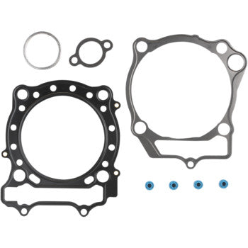 The Suzuki Top End Gasket Kit 96 mm by Cometic features precision-shaped gaskets, four blue O-rings, and MLS head gaskets with Extreme Sealing Technology, all arranged on a plain white background.