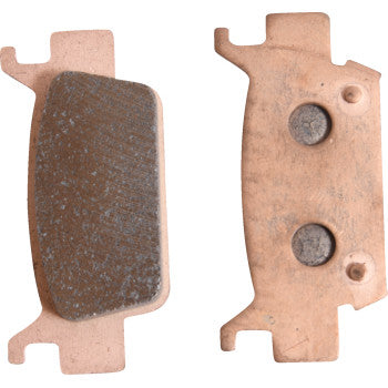 Two Sintered Brake Pads by All Balls shown side by side—one highlights the textured friction surface for superior stopping power, while the other displays a smooth backing plate with two circular recessed areas.