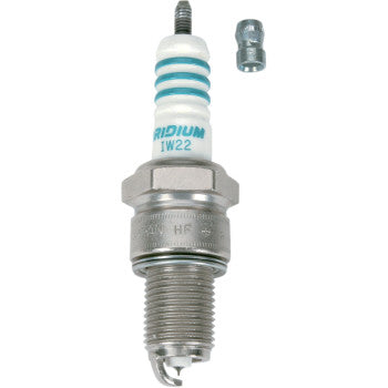 The Denso Iridium Spark Plug IW22 features a white ceramic insulator, metal threads, and a small metal cap, shown on a plain white background. It is designed for enhanced firing performance and superior high temperature resistance.