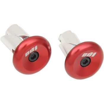 Pair of red aluminum handlebar end plugs with black center screws and white Odi logo.