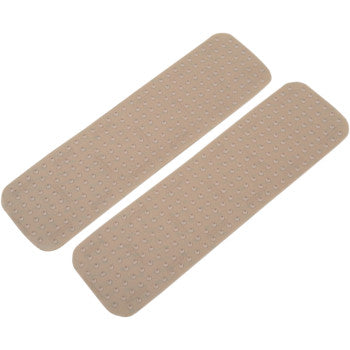 Two clear Traction Pad All Purpose Strips by Stompgrip, rectangular with rounded corners and small perforations, are laid side by side on a white background.
