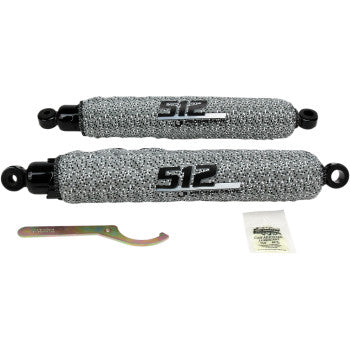 Pair of silver textured 512 Series rear shocks with black mounts, wrench, and mounting hardware kit.