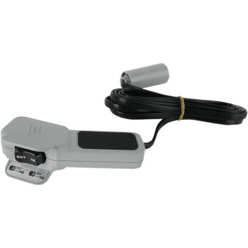 The Replacement Remote by Warn is a silver and black corded foot pedal switch, commonly used for a winch, featuring a long black cable and OUT/IN labels near the connector, shown on a white background.
