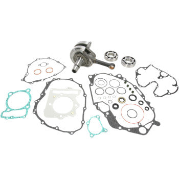 The Honda Crankshaft Kit OE Crankshaft Replacement by Hot Rods, including engine gaskets, seals, a crankshaft, and ball bearings, is arranged on a white background and crafted to meet OEM specs for reliable performance.