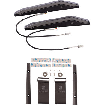 Pair of slim black LED running lights with wiring harnesses, mounting brackets, and adhesive strips.