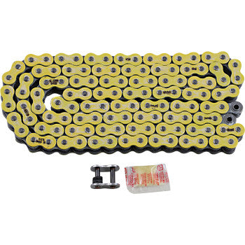 The 525 Max X Drive Chain 120 Links Yellow by RK, made in Japan, is shown flat with a silver finish, including a connecting link and lubricant packet for easy installation.
