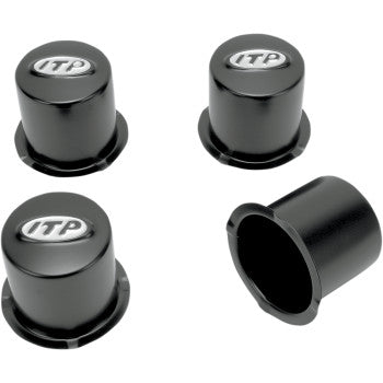 The Center Cap Replacement Delta Wheel 4-110 Black 4 Pack by ITP features four black plastic caps with the ITP logo, shown from multiple angles, making them ideal finishing touches for your ITP wheels or complete wheel kits.