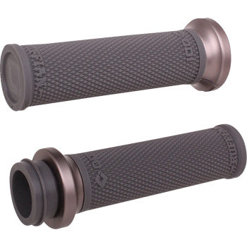 Two black and gunmetal Indian Ruffian Lock-On Grips - TBW by Odi are shown from various angles on a white background. Inspired by Ruffian Lock-On Street Grips, they feature a knurled texture for enhanced grip and control.