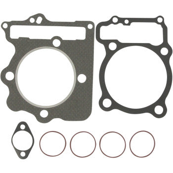 The Honda Top End Gasket Kit 86 mm by Cometic includes MLS head gaskets and seals, two large irregular gaskets, one small gasket, and four O-rings, all neatly displayed on a white background.