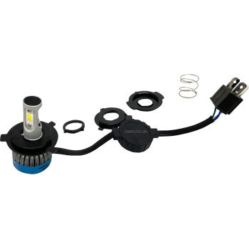 The H4 LED Replacement 4200 lm by Rivco Products includes a bulb, wiring, plug connector, mounting rings, and metal spring—all laid out on a white background for an easy plug-and-play upgrade to bright daylight-white light.