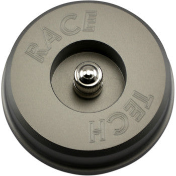 The 54 mm Extended Shock Reservoir Cap by Race Tech is a round, billet aluminum cap featuring "RACE TECH" engraving and a central screw within a recessed circular area for enhanced function and style.