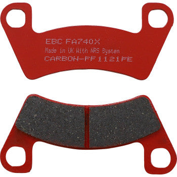 Red sport carbon brake pads with black friction surface, curved shape, and mounting holes on each end.