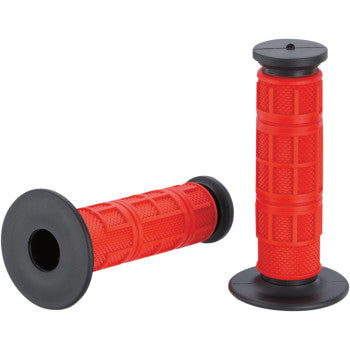Two Qualifier Grips Full Waffle Red by Moose Offroad, featuring dual compound with textured patterns and wide black flanges—one upright, one horizontal. Designed for twist throttle vehicles, they combine comfort with a firm yet soft grip.
