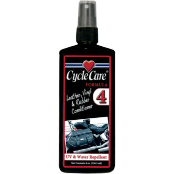 A black spray bottle of Formula 4 Leather Vinyl (8 fl oz) by Cycle Care Formulas, shown with a motorcycle saddlebag, offers UV protection and water repellency for long-lasting care of leather and vinyl surfaces.