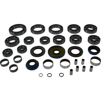The Polaris Transaxle Bearing Seal Kit by Moose Offroad features quality EMQ bearings, TC rubber seals, rings, and bushings arranged in neat rows on a white background.