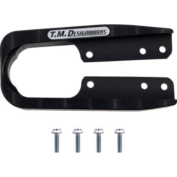 The Polaris Front Chain Slider Black by T.M. Designworks, made from composite material with an oval opening and four mounting holes, is shown above four silver screws for enhanced durability.