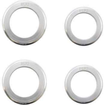 The Can Am Defender Lift Kit by Demon includes four circular metal rings, each engraved with RSP2. Two larger rings boost ground clearance or suit a lift kit, while two smaller rings complete the square arrangement.
