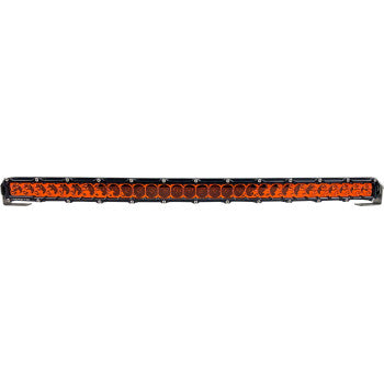 A straight-on view of the Light Bar 30" Flood Spot Curved by Heretic, featuring an orange-tinted lens, black housing, and stainless steel mount. Made in the USA for durability—perfect for vehicles or off-road LED lighting.