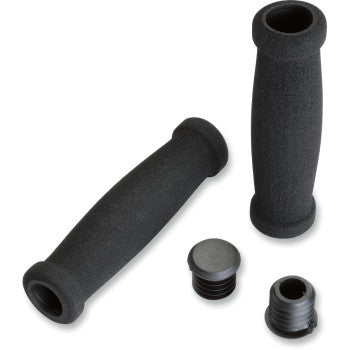 ATV Foam Grips Black by Moose Offroad are displayed for 7/8" bars with matching end plugs on a white background. One grip stands upright, while the other and the plugs lie flat. Perfect for bikes featuring thumb throttles.
