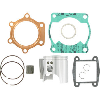 The Yamaha YFS200 Blaster Piston Kit with Gaskets 67.00mm by Wiseco includes a piston kit, piston rings, green and black top-end gaskets, a copper ring, a needle bearing, and two circlips arranged neatly.