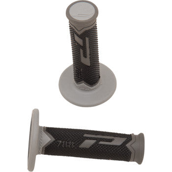 The Pro Grip Cross Triple Density 788 Grips in dark gray, gray, and black feature raised textures, the 788 logo, and a flared base. Designed for standard 7/8 handlebars, their triple density construction reduces vibration for improved comfort.